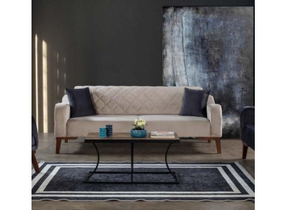 Beige divano a tre posti elegante in velluto per il salotto.