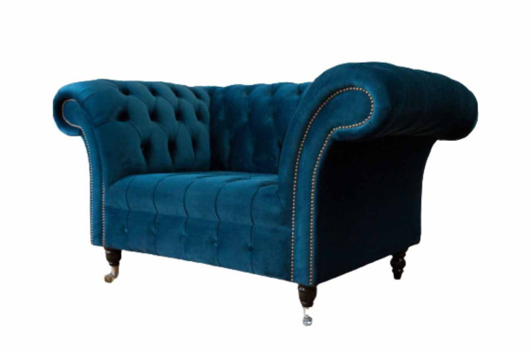 Chesterfield poltrona design divano blu in tessuto.