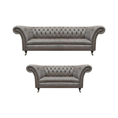 Divani in pelle grigia Chesterfield da salotto di design.