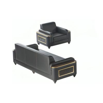 Studio 3 posti con divano e poltrona neri in stile monocromatico per la sala.   Studio 3 posti con divano e poltrona neri in stile monocromatico per la sala.