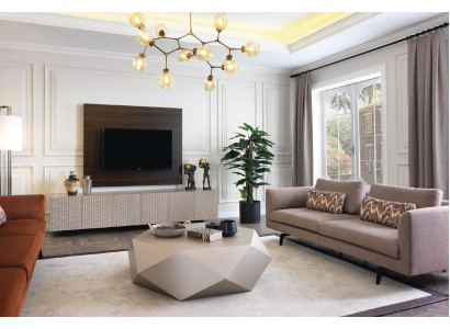 Soggiorno tavolino design mobili di lusso arredamento divano beige.