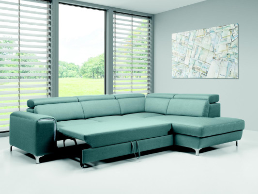 Divano ad angolo morbido e confortevole di design in un esclusivo blu per il soggiorno.