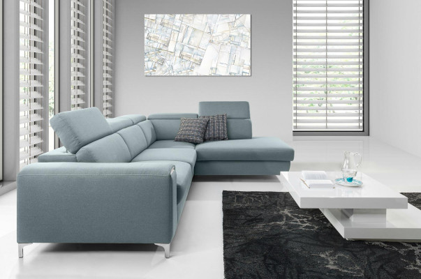 Divano ad angolo morbido e confortevole di design in un esclusivo blu per il soggiorno.