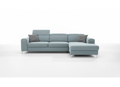 Divano ad angolo morbido e confortevole di design in un esclusivo blu per il soggiorno.