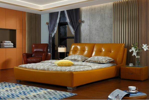 Letto matrimoniale design in pelle per camera da letto di lusso in hotel.