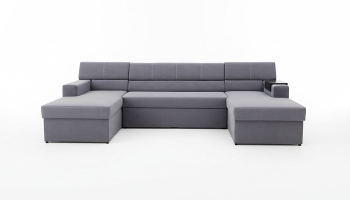 Divano angolare design Markos a forma di U con funzione letto, rivestito in pelle e tessuto.