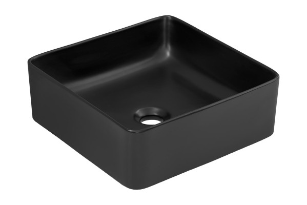 Lavabo in ceramica nera da appoggio con piano tavolo per lavandino.