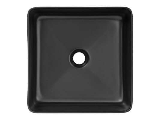 Lavabo in ceramica nera da appoggio con piano tavolo per lavandino.