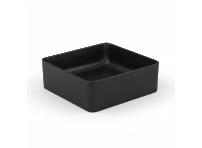 Lavabo in ceramica nera da appoggio con piano tavolo per lavandino.