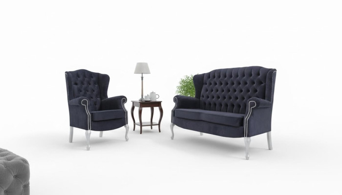 Classico divano Chesterfield a due posti in velluto imbottito.
