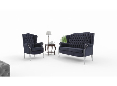 Classico divano Chesterfield a due posti in velluto imbottito.