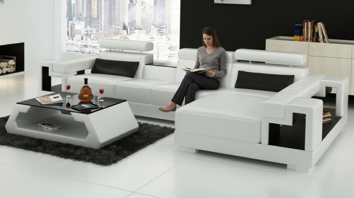 Divano ad angolo a forma di L in pelle per il soggiorno soundeperunacdal design.