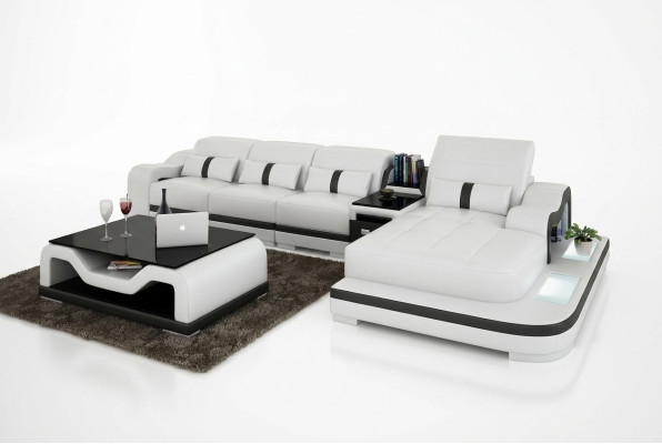 Divano a L in tessuto con funzione letto e design in pelle o tessuto.