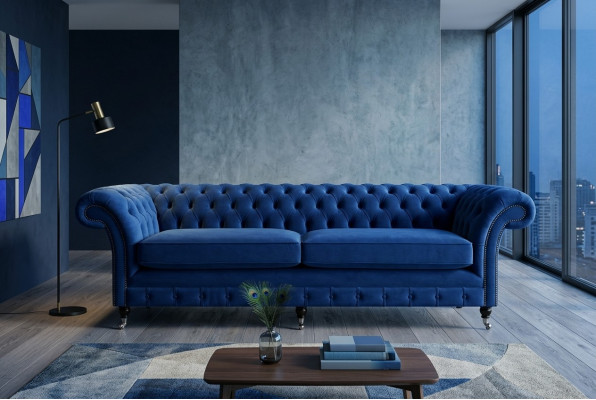 Divano Chesterfield classico 4 posti in velluto e pelle blu design imbottito.