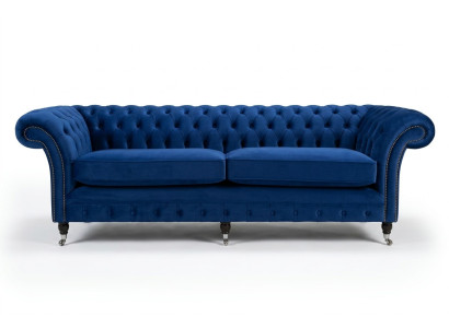 Divano Chesterfield classico 4 posti in velluto e pelle blu design imbottito.