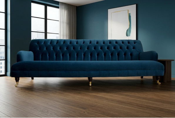 Grande divano Chesterfield blu a quattro posti xxl di lusso con imbottitura.