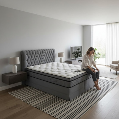 Camera da letto di lusso grigia con letto Chesterfield, design di imbottitura e letti matrimoniali di lusso.