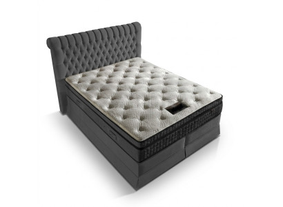 Camera da letto di lusso grigia con letto Chesterfield, design di imbottitura e letti matrimoniali di lusso.