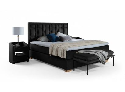 Lussuoso letto boxspring nero con letti blu - design di mobili per la camera da letto matrimoniale dell'hotel.