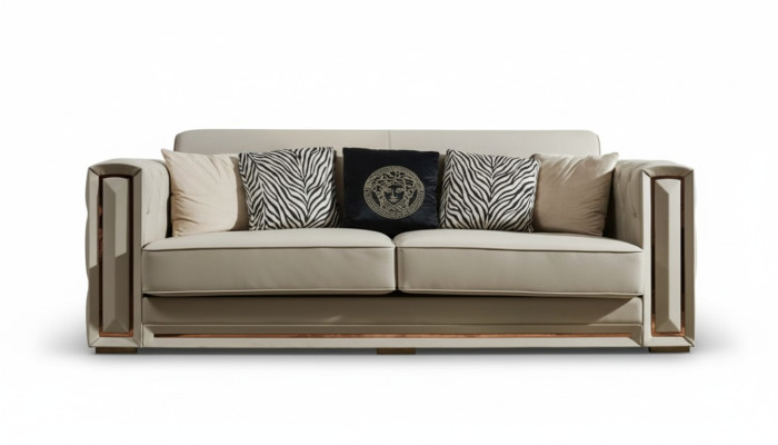 Divano Chesterfield in pelle beige design lussuoso per soggiorno.