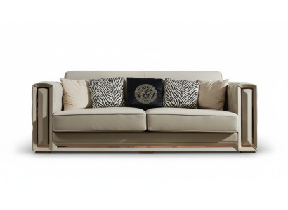 Divano Chesterfield in pelle beige design lussuoso per soggiorno.