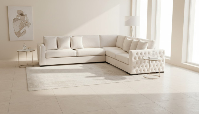 Divano angolare crema con rivestimento in velluto design divano angolare imbottito in stoffa.
