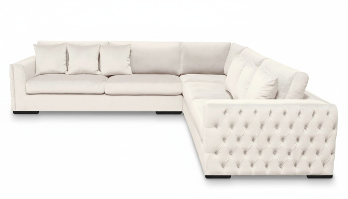 Divano angolare crema con rivestimento in velluto design divano angolare imbottito in stoffa.