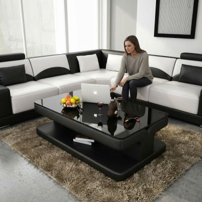 Tavolino design in pelle e vetro per tavoli moderni imbottiti.