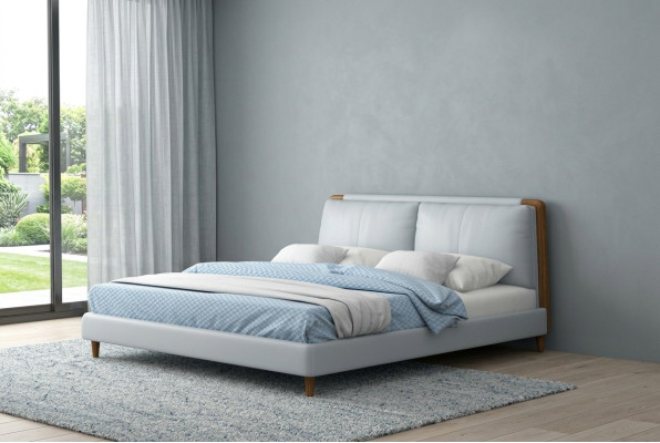 Moderno letto matrimoniale 180x200 in design in pelle bianca su gambe di legno