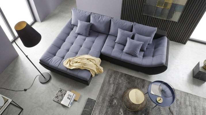 Sofà di design moderno in tessuto a L per il soggiorno delle cucine.