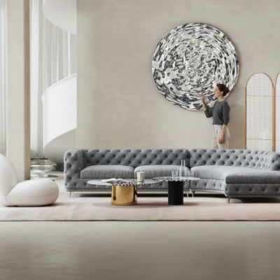 Divano Chesterfield design lounge in tessuto ad angolo a L con chaise longue.