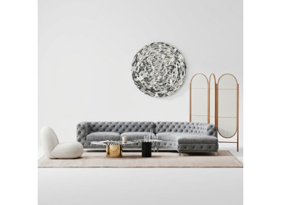 Divano Chesterfield design lounge in tessuto ad angolo a L con chaise longue.