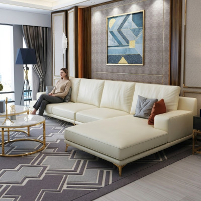 Garnitura divano design angolare con pouf imbottito.