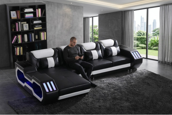 Divano a forma di L per il relax con illuminazione, per arredare il soggiorno.