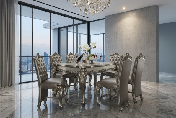 Tavolo da pranzo grigio classico rettangolare con 8 sedie in legno e pelle stile Chesterfield.