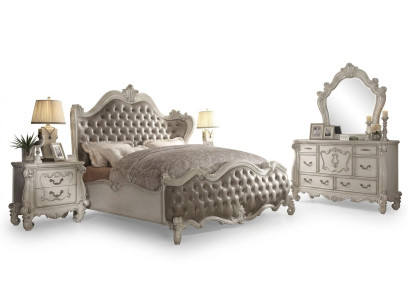 Set da camera da letto di lusso con letto design decorativo, 2 comodini e cassettiera.