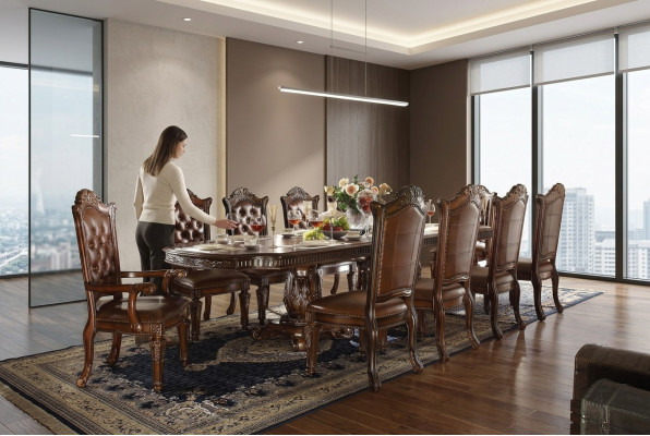 Lussuoso set da sala da pranzo in stile barocco con tavolo da pranzo designer e sedie Chesterfield marroni.