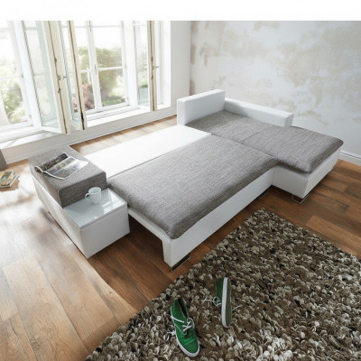 Divano letto design angolare a L con funzione letto, tessuto di divano in stoffa.
