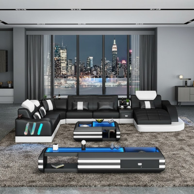 Design divano angolare illuminato in pelle con luci a LED.