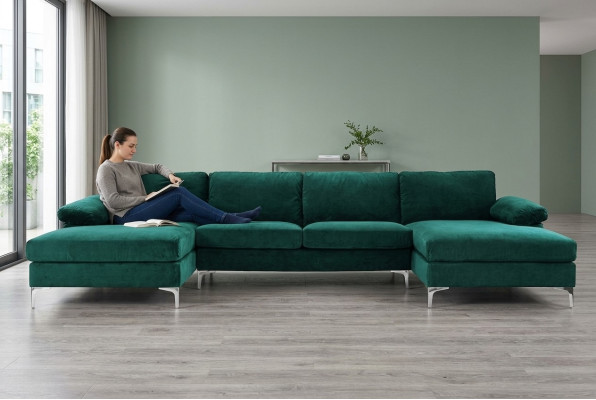 Divano ad angolo a forma di U verde design per il soggiorno.