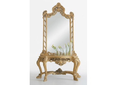 Tavolo console intagliato di lusso e specchio in un elegante telaio