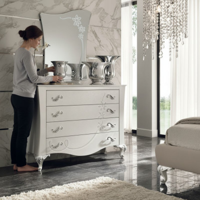 Comò con specchio in legno in stile moderno per la camera da letto.