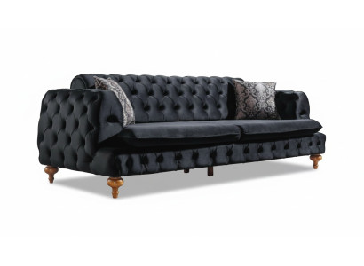 Divano Chesterfield di lusso a tre posti. Arredamento di divani neri.