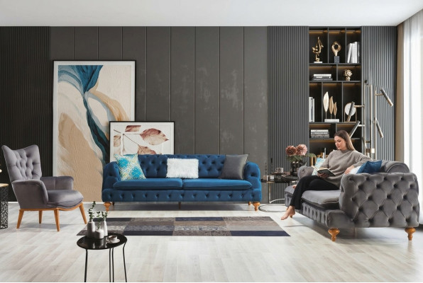 Poltrona monoposto grigia per soggiorno in stile inglese Chesterfield.