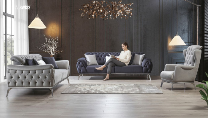 Divano blu a 3 posti in stile Chesterfield di lusso per il salotto italiano.