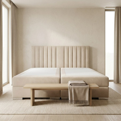 Un letto confortevole e funzionale è realizzato con materiali di alta qualità in stile moderno.