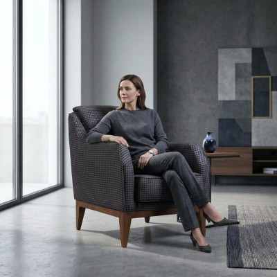 Grigia poltrona imbottita a un posto con braccioli, poltrona da salotto, sedia di design.