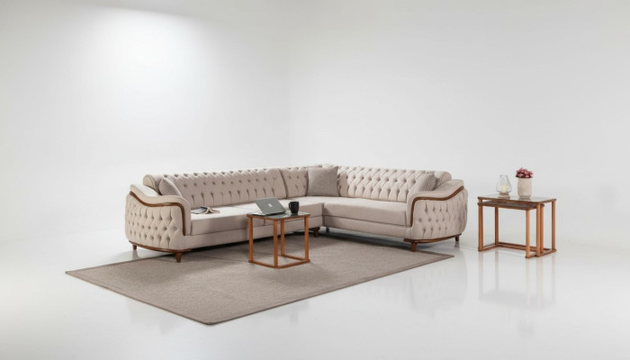 Divano ad angolo Chesterfield.