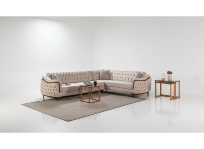 Divano ad angolo Chesterfield.