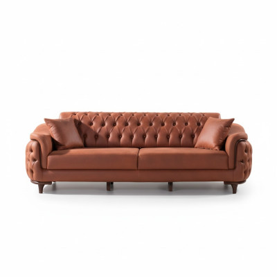 Divano Chesterfield arancione a tre posti in velluto con cuscini in legno.